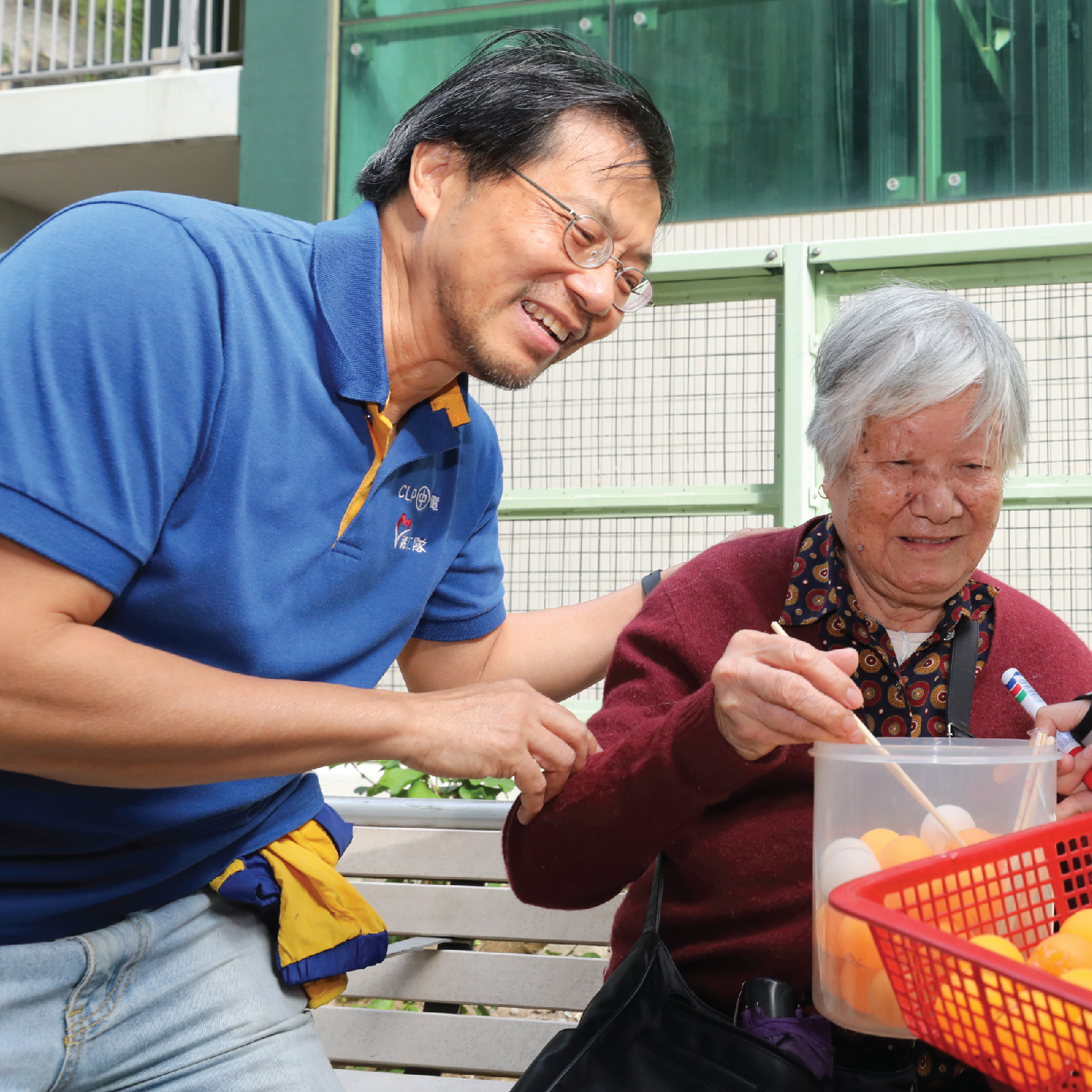 CLP Volunteers playing fun game with the elderly