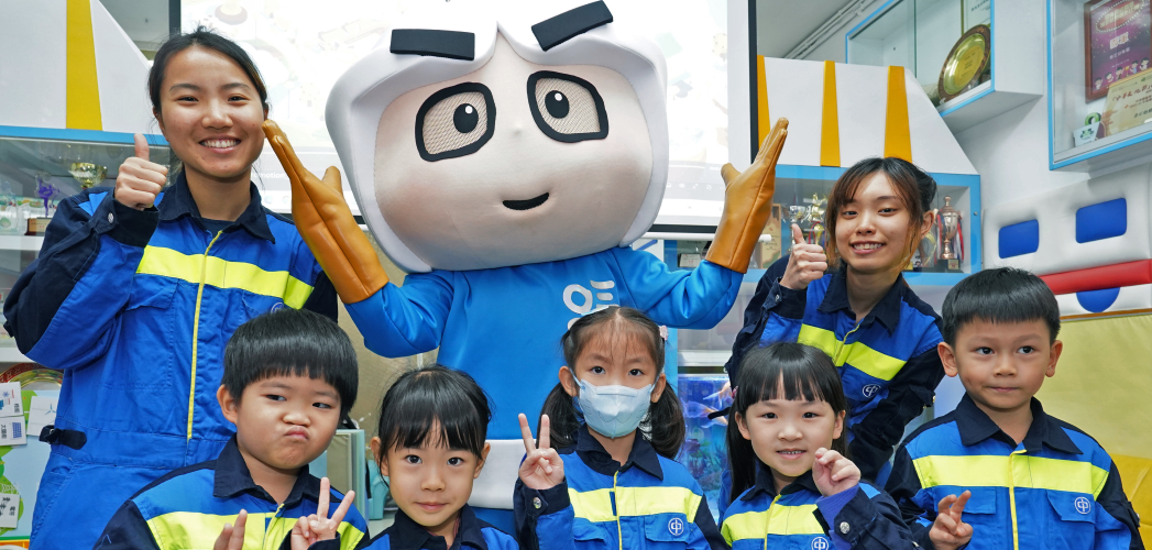 Power Kid with kindergarten students at POWER YOU Kindergarten Visitation Programme