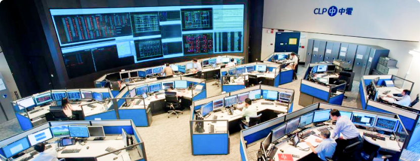 Engineers working in system control room
